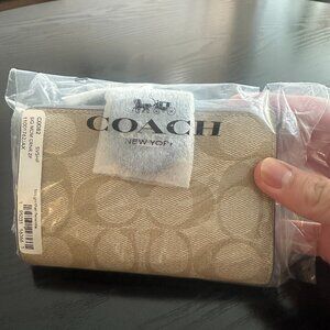 Coach medium corner zip wallet
